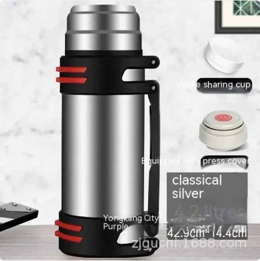 Large blue 1L stainless steel insulated thermos by Mead's Supply & Equipment Outfitters with a durable, sleek design.