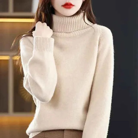 Women's green Merino wool high-neck sweater top by Mead's Supply & Equipment Outfitters, soft and warm for cold weather.
