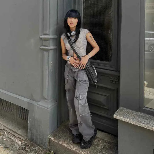 Grey women's Street Retro low-rise denim cargo pants by Mead's Supply & Equipment Outfitters, featuring a relaxed fit and classic cargo pockets.