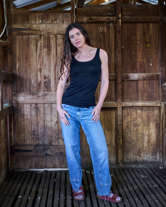 Women's black scoop neck tank top made from 100% Merino wool by Merino 365 NZ, perfect for comfortable layering.