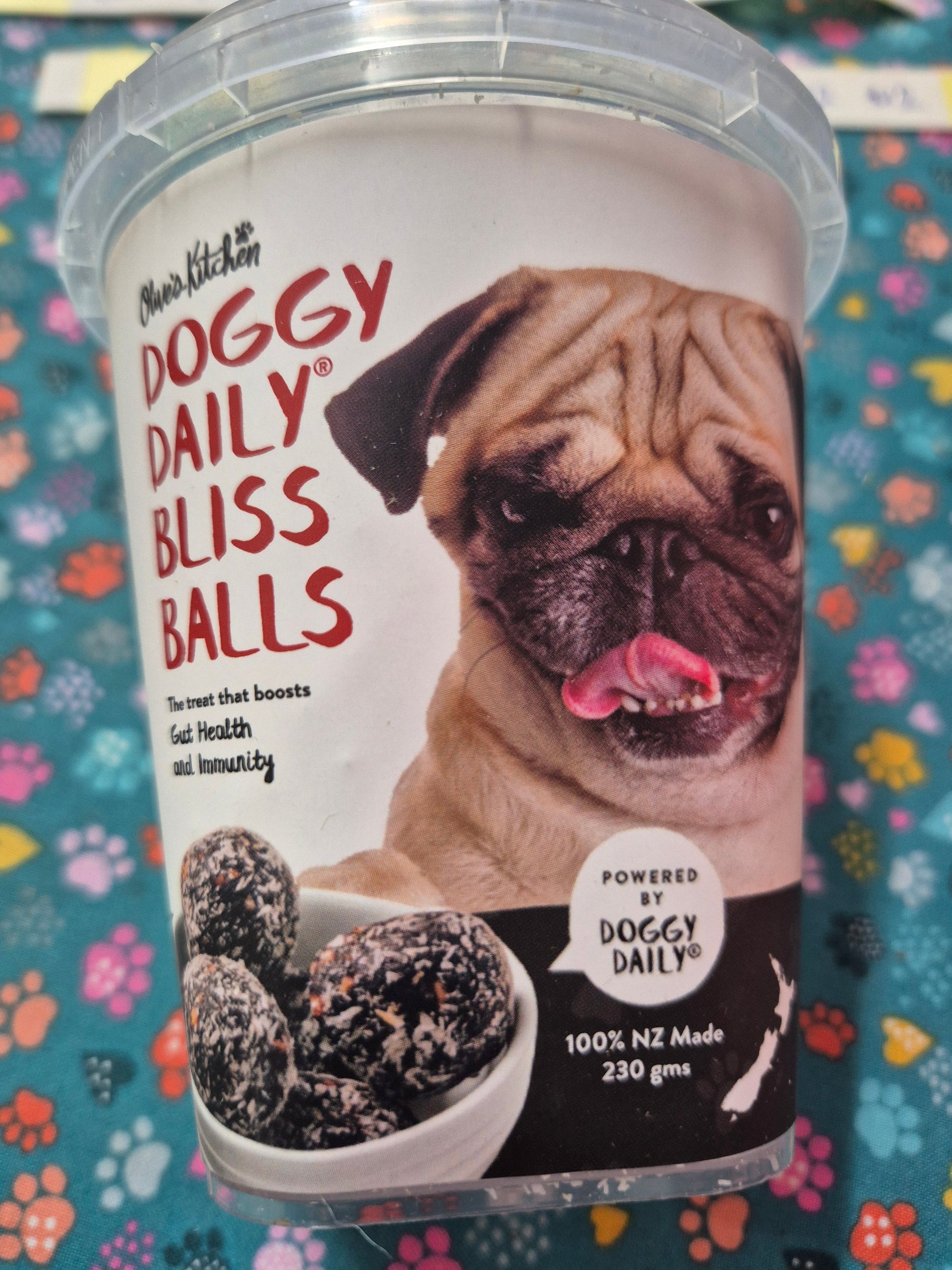 Doggy Daily Bliss Balls by Animal Addiction Limited, healthy dog treats with natural ingredients, shown in a close-up image.