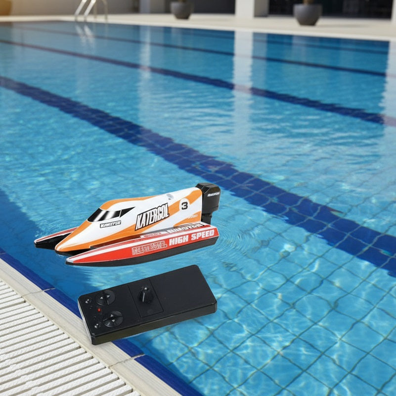 Yellow remote control racing boat by dealonline.co.nz, shown on water with sleek design and vibrant yellow color.