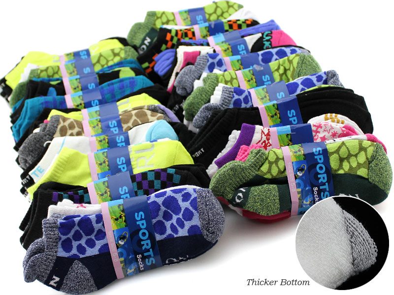 Pair of women's cushioned ankle sport socks in white, featuring breathable fabric and comfortable fit for active wear.