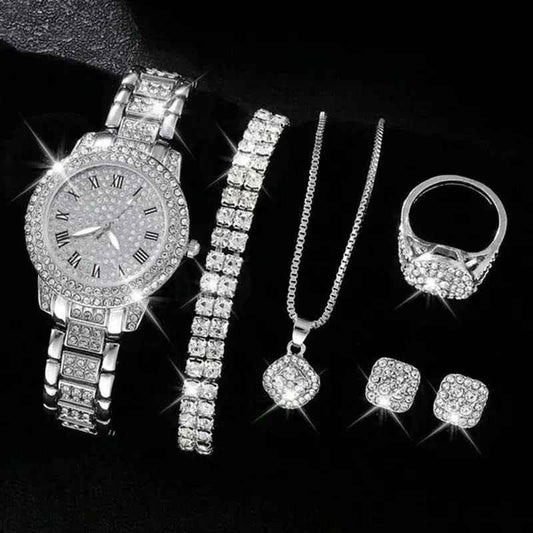 Luxury women's jewelry set with a gold diamond watch featuring Roman numerals, stylish 3Sixty5 brand, elegant and sophisticated.