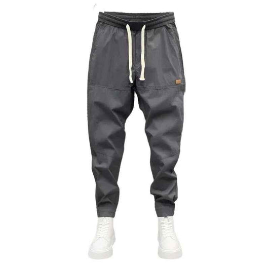 Black Stylish 3Sixty5 Urban Seasonal Jogger Trousers shown with a relaxed fit and elastic waistband for casual comfort.