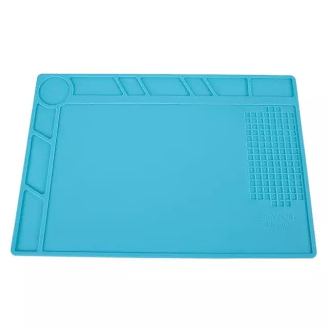 Watch repair electronics mat by That Watch Shop with watch tools and compartments for safe handling of watch components.
