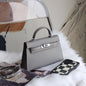 A fashionable women's handbag with a one-shoulder crossbody strap