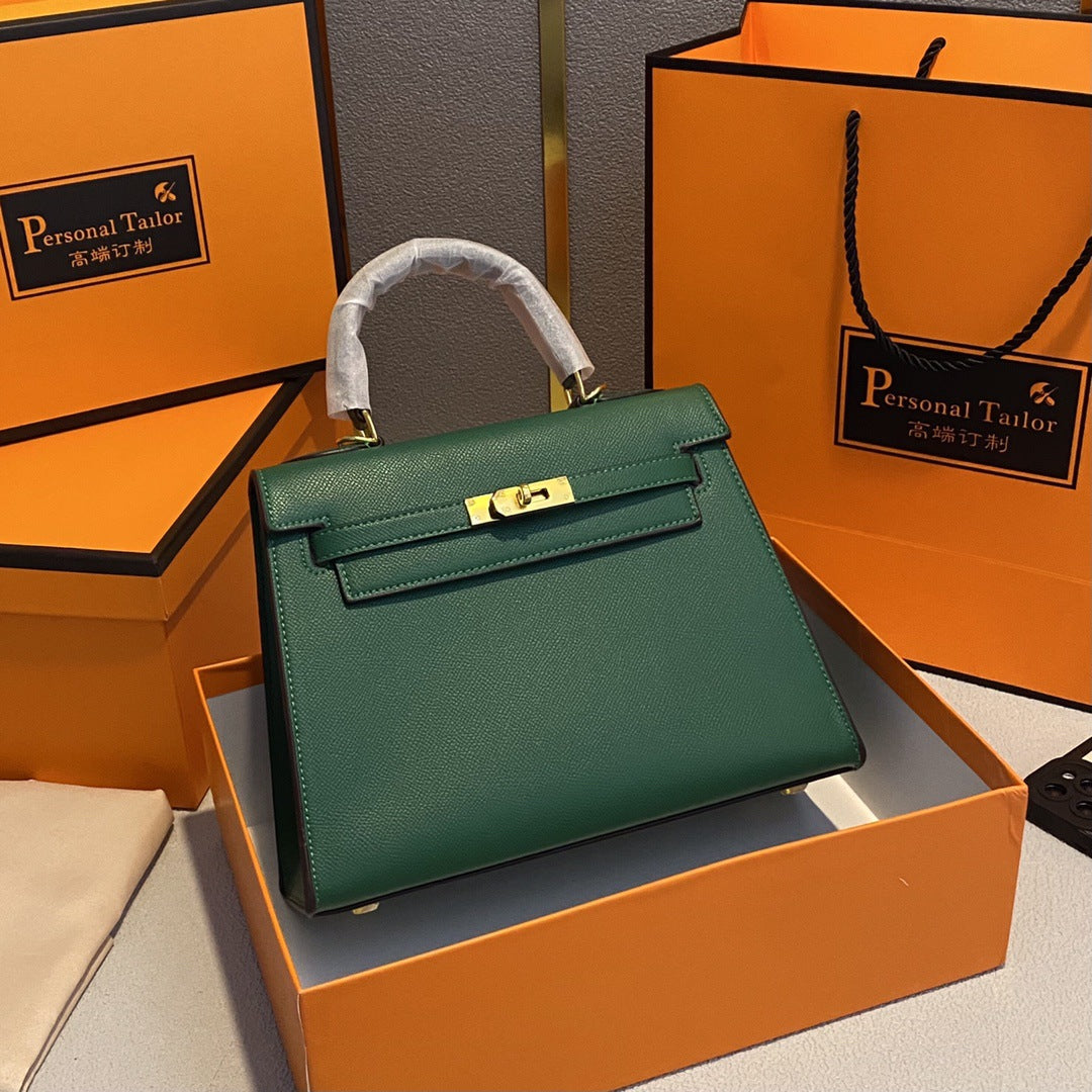 A fashionable women's handbag with a one-shoulder crossbody strap