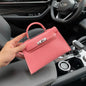 A fashionable women's handbag with a one-shoulder crossbody strap