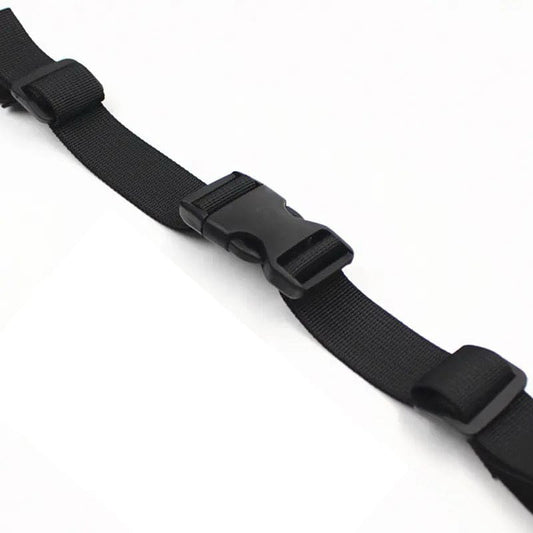 Black 9eight5 backpack chest strap attached to a backpack, adjustable strap for comfort and secure fit during outdoor activities.