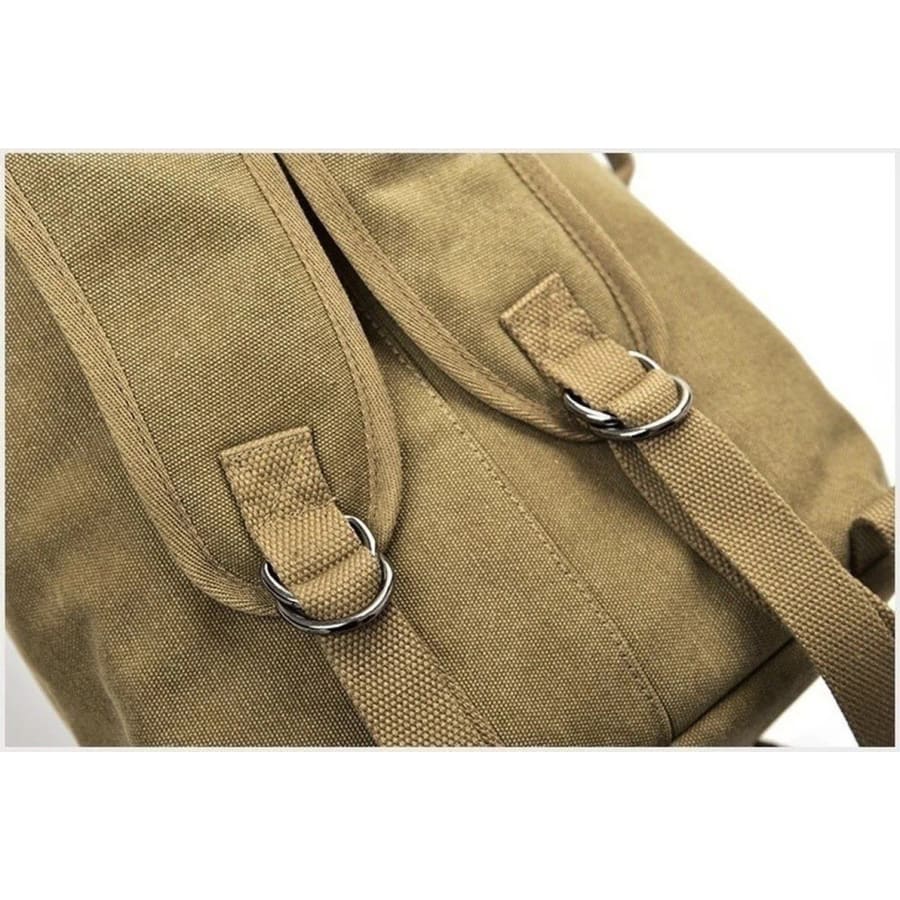 Khaki 9eight5 backpack and duffel bag with military style, featuring durable fabric and multiple compartments.
