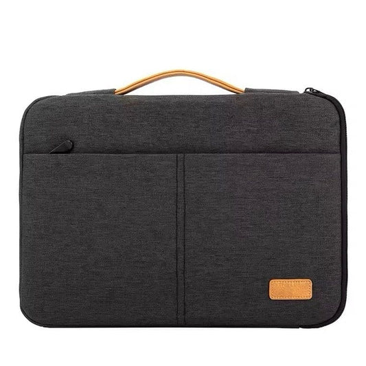 9eight5 15.6-inch laptop bag showing padded exterior, zipper closure, and adjustable shoulder strap for laptop protection.
