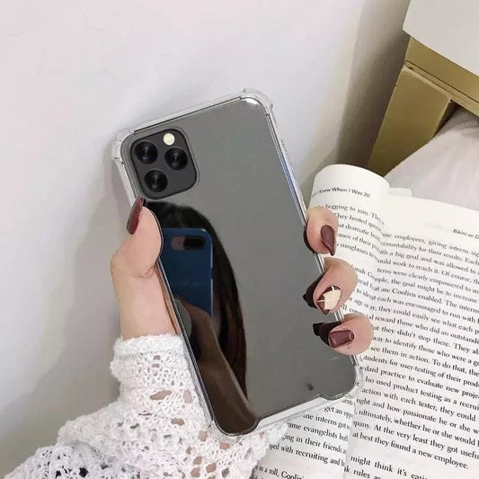 Black mirror silicone phone case for iPhone 11 by 9eight5, showing the sleek, reflective surface and snug fit on the device.
