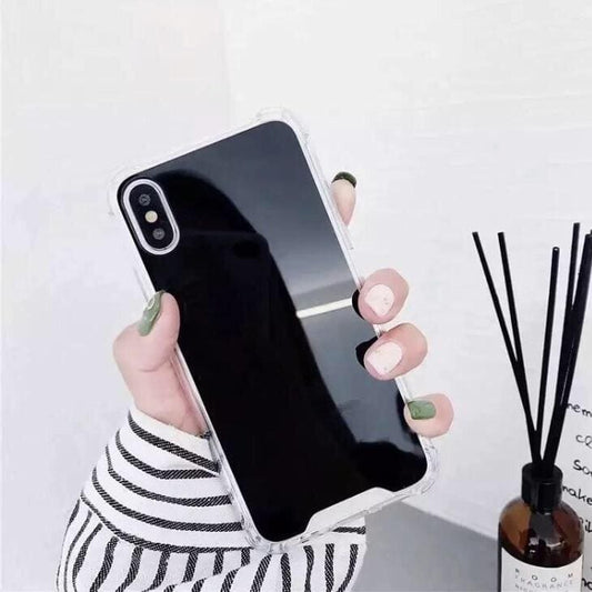 Black mirror silicone case for iPhone 11 by 9eight5, showing a sleek, reflective phone case with smooth texture and precise cutouts.