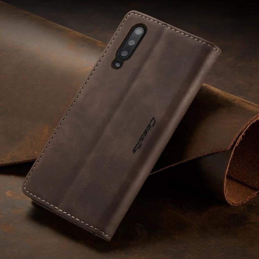 Brown 9eight5 wallet case for Samsung Galaxy A10s, with card slots and protective cover, designed for stylish phone protection.