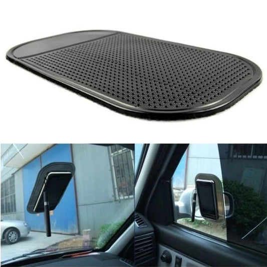 9eight5 car dashboard anti-slip mat holding phone and tablet securely on vehicle dashboard.