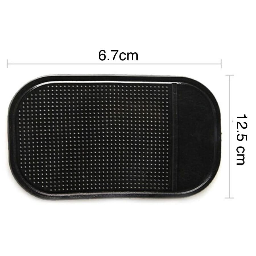 9eight5 car dashboard anti-slip mat holding phone and tablet securely on the vehicle's dashboard surface.