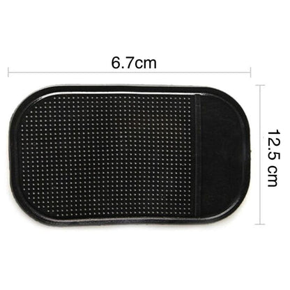 9eight5 car dashboard anti-slip mat holding phone and tablet securely on the vehicle's dashboard surface.