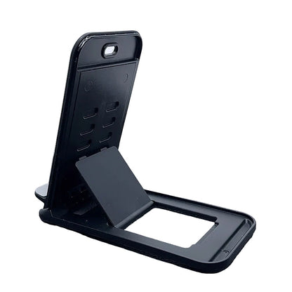9eight5 Mobigo desktop phone and tablet holder stand on a workspace, adjustable accessory for easy device viewing.