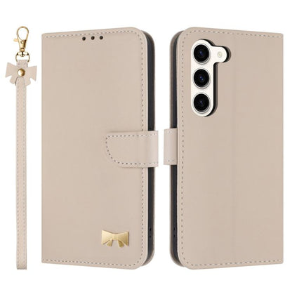 Metal Bow Leather Phone Case with Hand Strap, For Samsung Galaxy S25 Ultra 5G, For Samsung Galaxy S24 FE 5G, For Samsung Galaxy S24 Ultra 5G, For Samsung Galaxy S23 FE 5G, For Samsung Galaxy S23 Ultra 5G, For Samsung Galaxy S23+ 5G                     ...