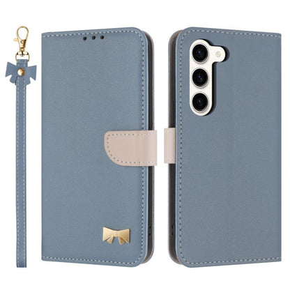 Metal Bow Leather Phone Case with Hand Strap, For Samsung Galaxy S25 Ultra 5G, For Samsung Galaxy S24 FE 5G, For Samsung Galaxy S24 Ultra 5G, For Samsung Galaxy S23 FE 5G, For Samsung Galaxy S23 Ultra 5G, For Samsung Galaxy S23+ 5G                     ...