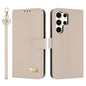 Metal Bow Leather Phone Case with Hand Strap, For Samsung Galaxy S25 Ultra 5G, For Samsung Galaxy S24 FE 5G, For Samsung Galaxy S24 Ultra 5G, For Samsung Galaxy S23 FE 5G, For Samsung Galaxy S23 Ultra 5G, For Samsung Galaxy S23+ 5G                     ...