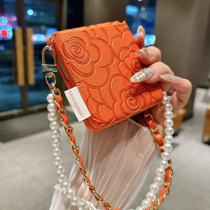 Side Buckle Embossed Camellia Phone Case with Bracelet, For Samsung Galaxy Z Flip7 5G