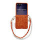 Side Buckle Embossed Camellia Phone Case with Bracelet, For Samsung Galaxy Z Flip7 5G