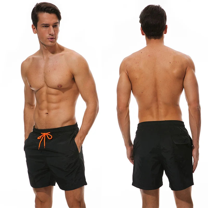 Men's beach boardshorts from ShopHub NZ with surf-inspired design, quick-drying fabric, ideal for swimming and beach sports.