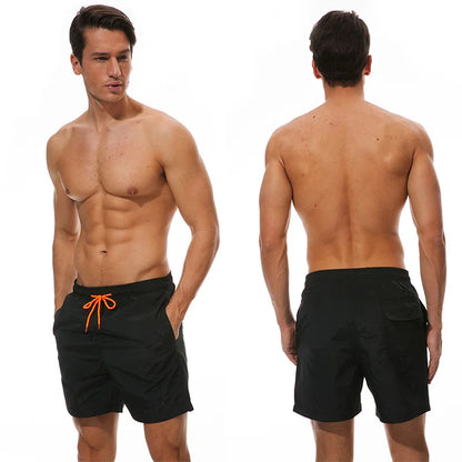 Men's beach boardshorts from ShopHub NZ with surf-inspired design, quick-drying fabric, ideal for swimming and beach sports.