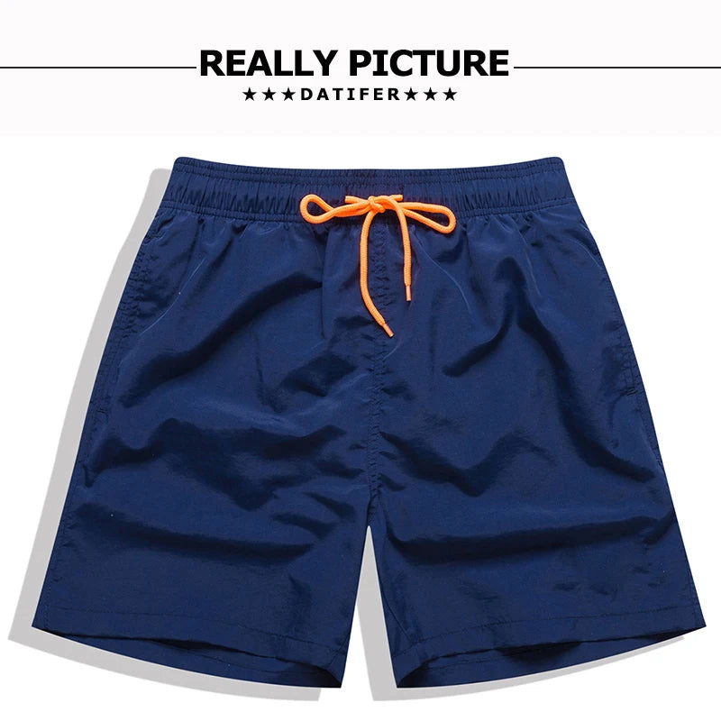 Men's beach boardshorts by ShopHub NZ featuring a sporty surfing design, lightweight fabric, and knee-length Bermuda style.