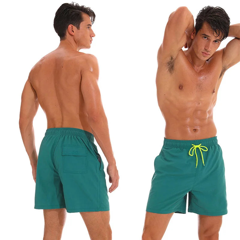 Men's black board shorts by ShopHub NZ, quick-dry swimwear for surfing, swimming, and beach activities, size 4XL.