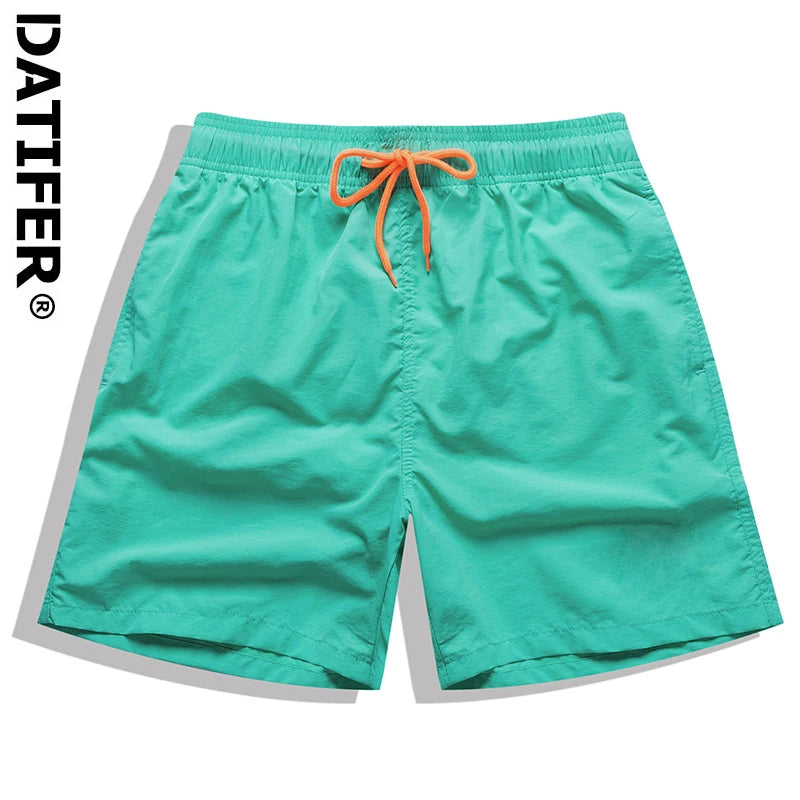 Men's surf board shorts from ShopHub NZ, quick-dry swimwear with athletic fit, ideal for beach, swimming, and summer activities.