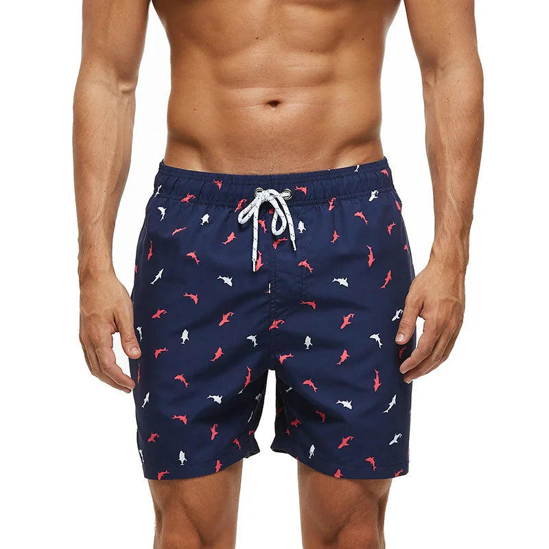 Men's summer boardshorts by ShopHub NZ featuring beach print, with pockets, ideal for surfing, swimming, and fitness activities.