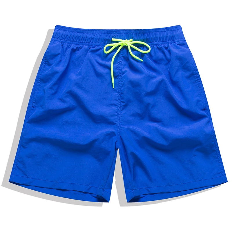 Men's beach boardshorts from ShopHub NZ, sporty surfing maillot de bain with vibrant design, suitable for swimming and beach activities.