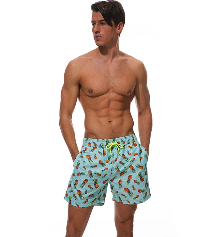 Men's polyester boardshorts by ShopHub NZ featuring vibrant print, ideal for surfing, swimming, and beachwear activities.