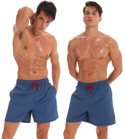 Men's surfboard shorts by ShopHub NZ featuring breathable nylon fabric, mesh liner, and vibrant design for active beachwear.