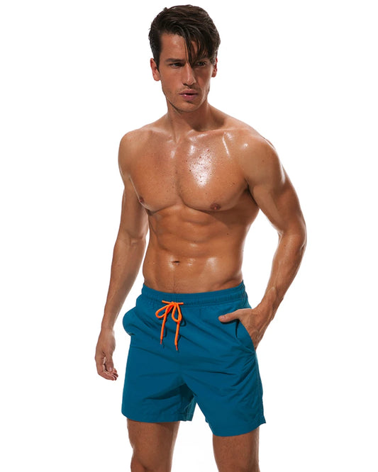Men's ShopHub NZ summer boardshorts with nylon fabric, mesh lining, drawstring waist, suitable for surfing and sports.