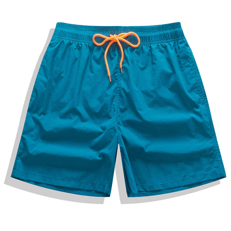 Men's swimwear by ShopHub NZ featuring breathable nylon surfboard shorts with mesh liner and stylish design.