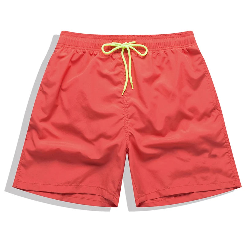 Men's surfboard shorts by ShopHub NZ featuring breathable mesh liner, nylon fabric, and stylish design for beach and swimming activities.