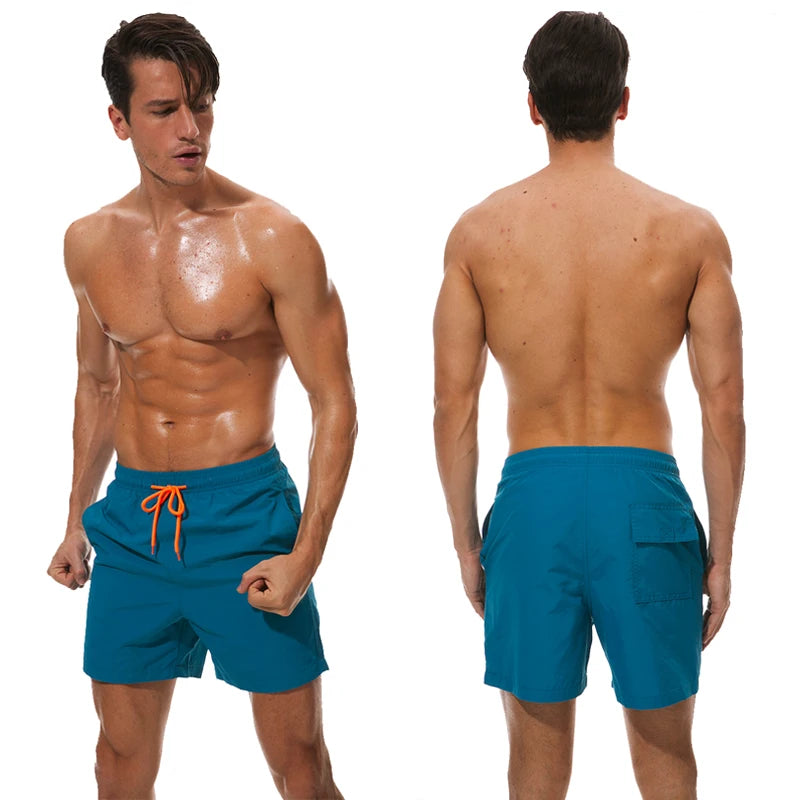 Men's surfboard shorts by ShopHub NZ with breathable mesh lining, nylon material, stylish design, ideal for swimming and surfing.