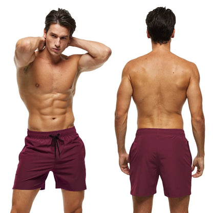 Men's Datifer Summer 2026 Gym Shorts with mesh liner, zipper pockets, quick-dry fabric, solid color, ideal for beach or gym use.