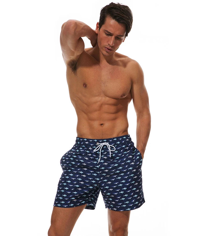 Men's summer swimming shorts by ShopHub NZ, printed polyester boardshorts with mesh liner, ideal for swimming, running, and sports.
