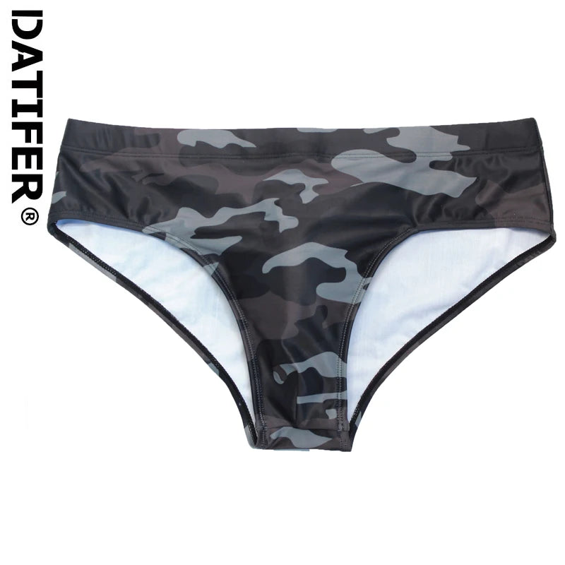 Men's navy swim briefs by ShopHub NZ, fitted swimwear with a comfortable waistband, perfect for swimming and beachwear.