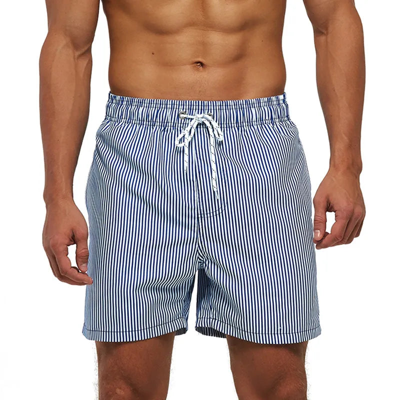 Men's summer polyester boardshorts with colorful print, quick-dry fabric, mesh liner, suitable for surfing, gym, and beach activities.