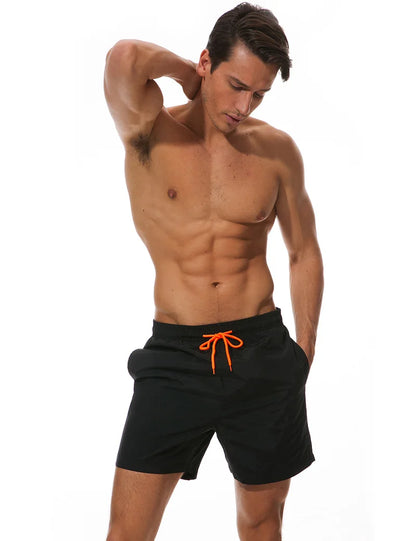 Men's beach boardshorts by ShopHub NZ featuring a sporty design, perfect for surfing and swimming, with a comfortable fit.