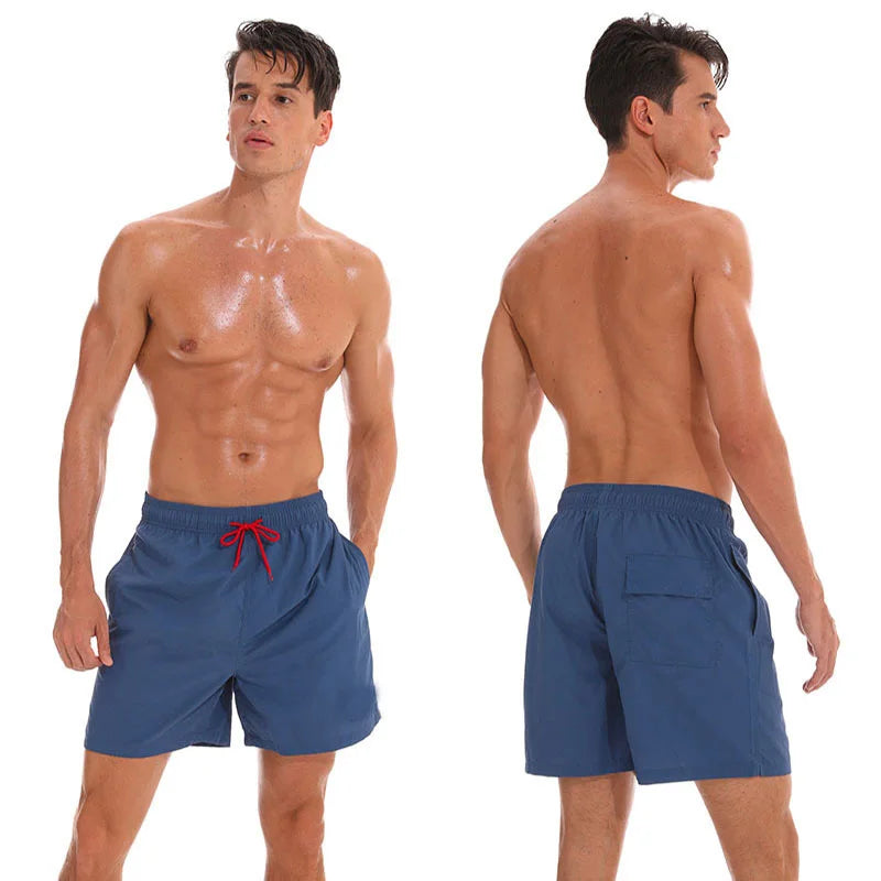 Men's beach boardshorts by ShopHub NZ featuring a sporty surfing style, lightweight fabric, and vibrant swimwear design.