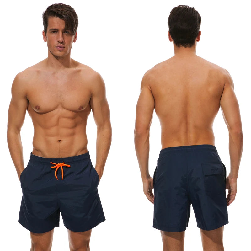 Men's beach boardshorts by ShopHub NZ featuring a stylish sporty design, ideal for surfing and swimming on the beach.