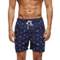 Men's black DATIFER 2026 summer boardshorts with elastic waistband, suitable for surfing, swimming, and beach fitness activities.