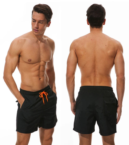 Men's swimming shorts by ShopHub NZ, solid color nylon boardshorts with breathable mesh liner, designed for sports and plus size fit.